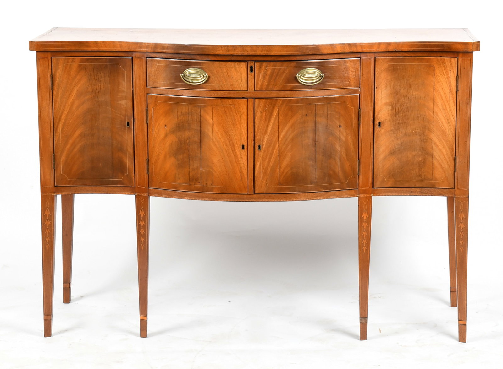 American Federal Style Inlaid Mahogany Sideboard, 19th Century: An American Federal Style Inlaid Mahogany Sideboard, Late 19th / Early 20th Century. The rectangular serpentine top above a single dovetailed drawer over a pair of cupboards, flanked by open cupboards