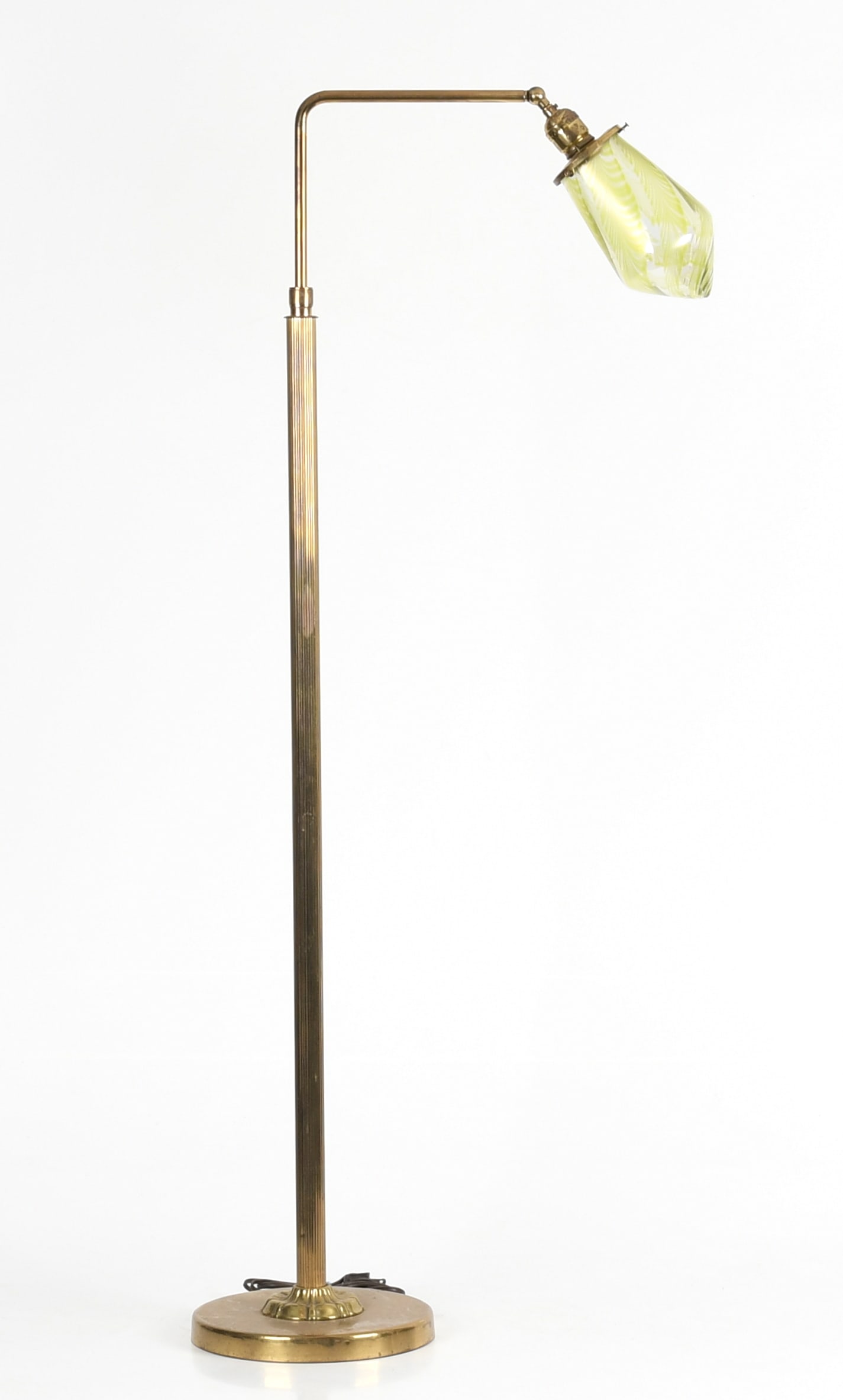A Brass Floor Lamp with Art Glass Shade: A Brass Floor Lamp with Art Glass Shade A vintage brass toned floor lamp marked for Hubbell with an art glass shade, possibly Loetz. Dimensions: the base is 9in diameter, the height is 49