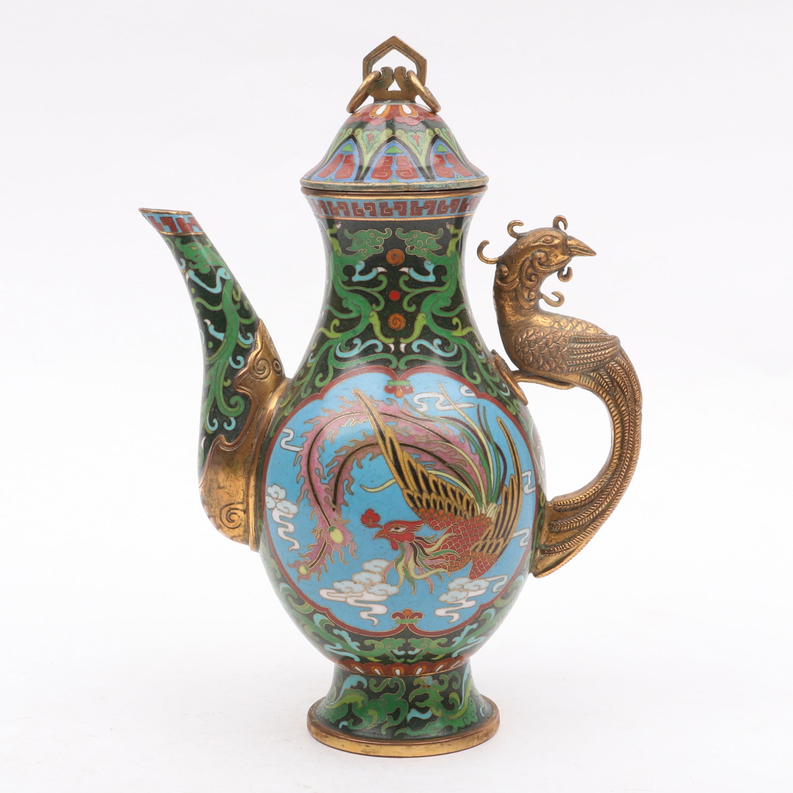 A Chinese Cloisonne Ewer: A Chinese Cloisonne Ewer Circa 1900, parcel gilt and with a phoenix form handle and reserves of dragon and phoenix decoration, unmarked. Dimensions: 7in from handle to spout, the height is