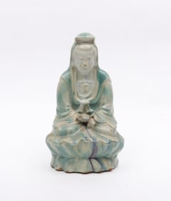 A Chinese Pottery Figure of Guanyin