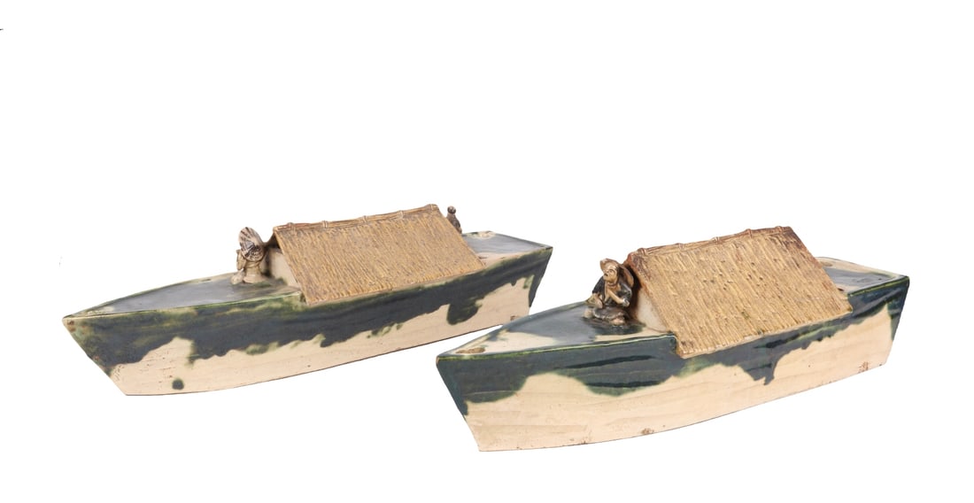 A Pair of Large Japanese Oribe Pottery Boats: A Pair of Large Japanese Oribe Pottery Boats Each hollow with draining holes and modeled with a thatch roof and applied figures. Dimensions: each is about 24in long, 9in wide and 7 1/