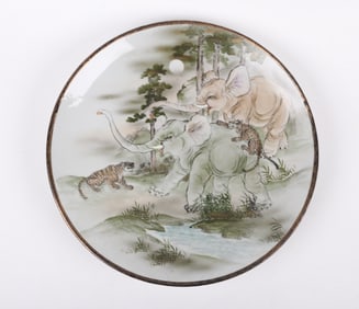 A Japanese Porcelain Kutani Charger, Elephants and Tigers
