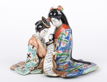 A Japanese Porcelain Shunga Figural Group