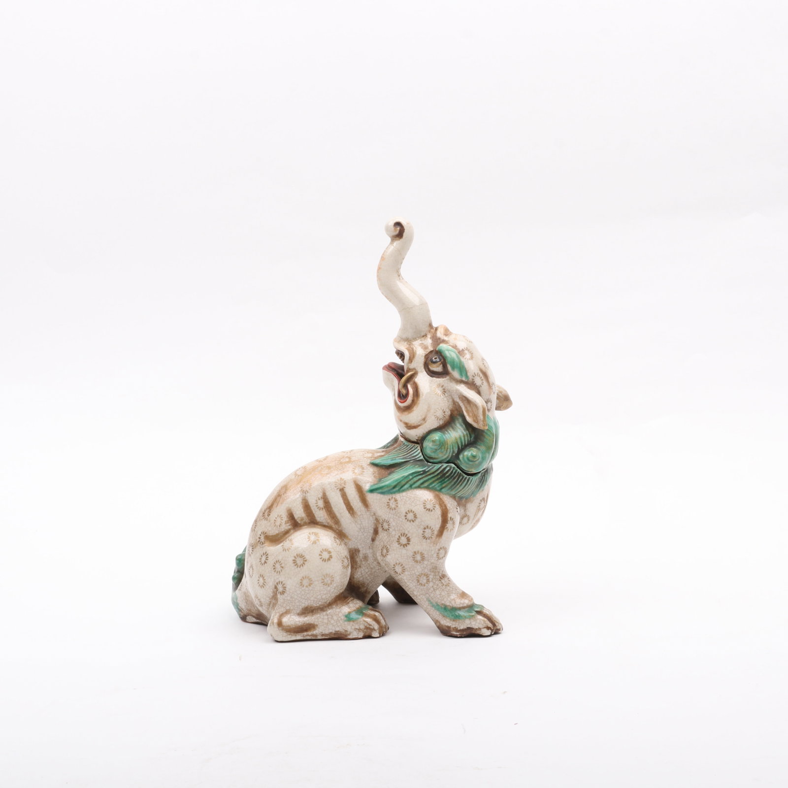 A Japanese Pottery Elephant Form Koro: A Japanese Pottery Elephant Form Koro A 19th century koro in two parts, unmarked. Dimensions: 7 1/2in x 5in, the height is 11 3/4in. Provenance:&nb