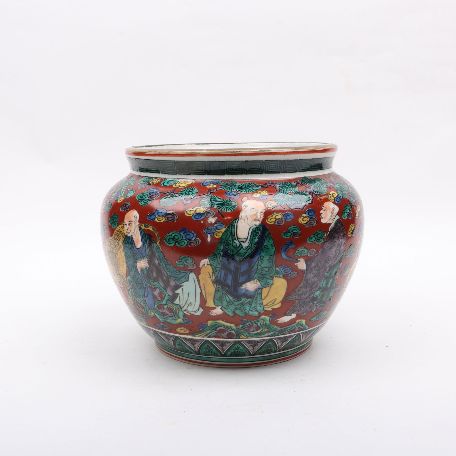 A Japanese Ko Kutani Style Jar: A Japanese Ko Kutani Style Jar 19th century, with a red ground and decorated with eight Rakan. Fuku mark as pictured. Dimensions: 12in in diameter, the height is 9in. &nb