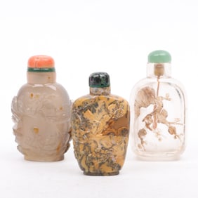 Three Chinese Hardstone Snuff Bottles