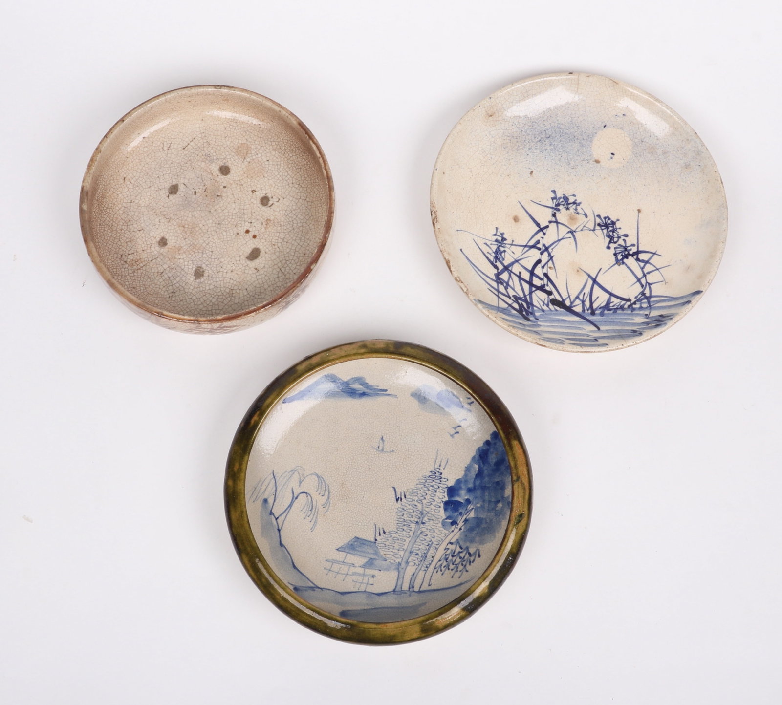 Three Pieces of Japanese Edo Period Pottery: Three Pieces of Japanese Edo Period Pottery An oil plate and two bowls, each with sparse decoration, none marked. Dimensions: from 8 1/4in to 9 3/4in diameter, the heights rang