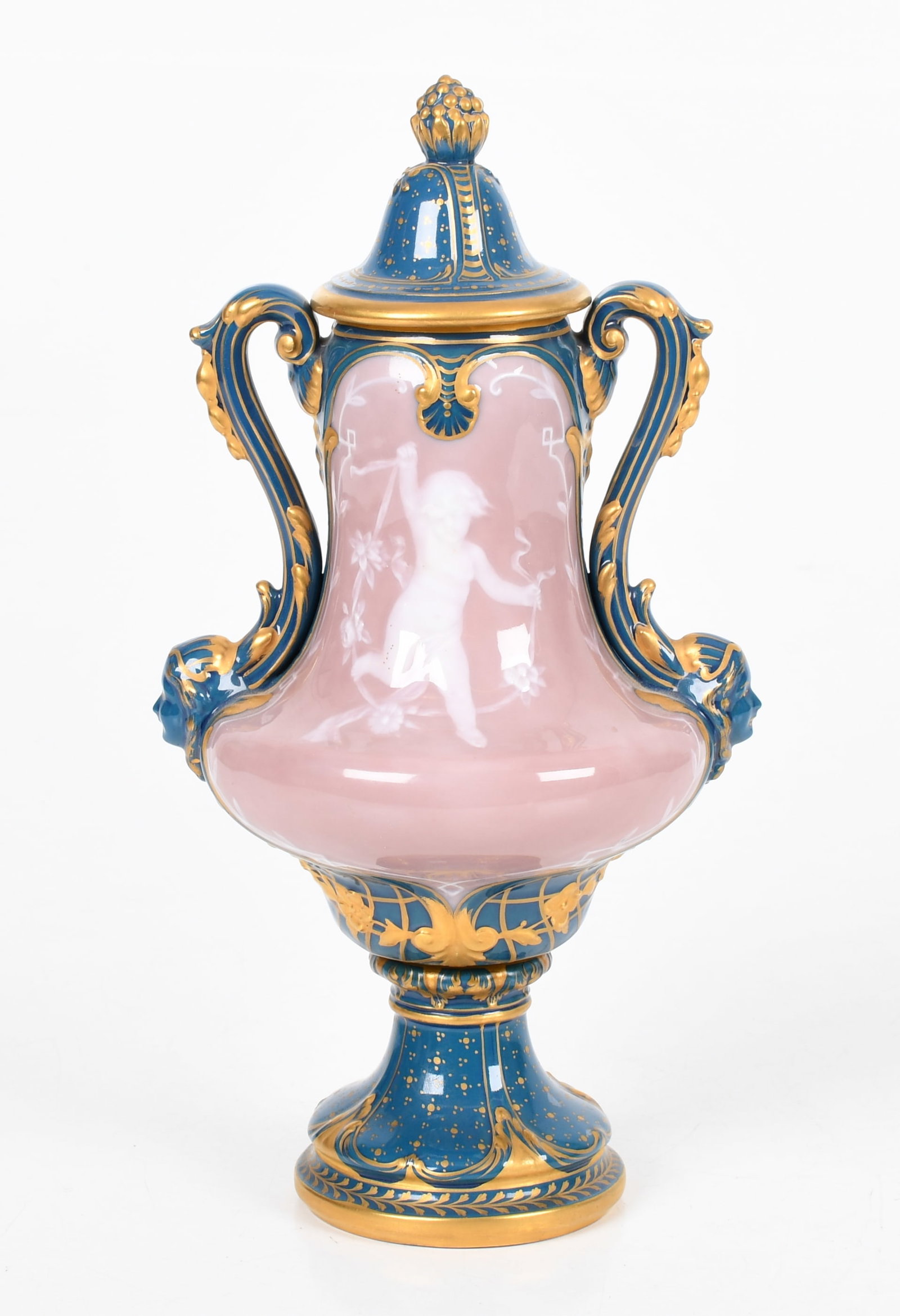 A Porcelain Pate Sur Pate Covered Urn: A Porcelain Pate Sur Pate Covered Urn A circa 1900 example in teal and pink with gilt elements, marked as pictured. Dimensions: 5 1/2in diameter, the height is 10 3/4in. <