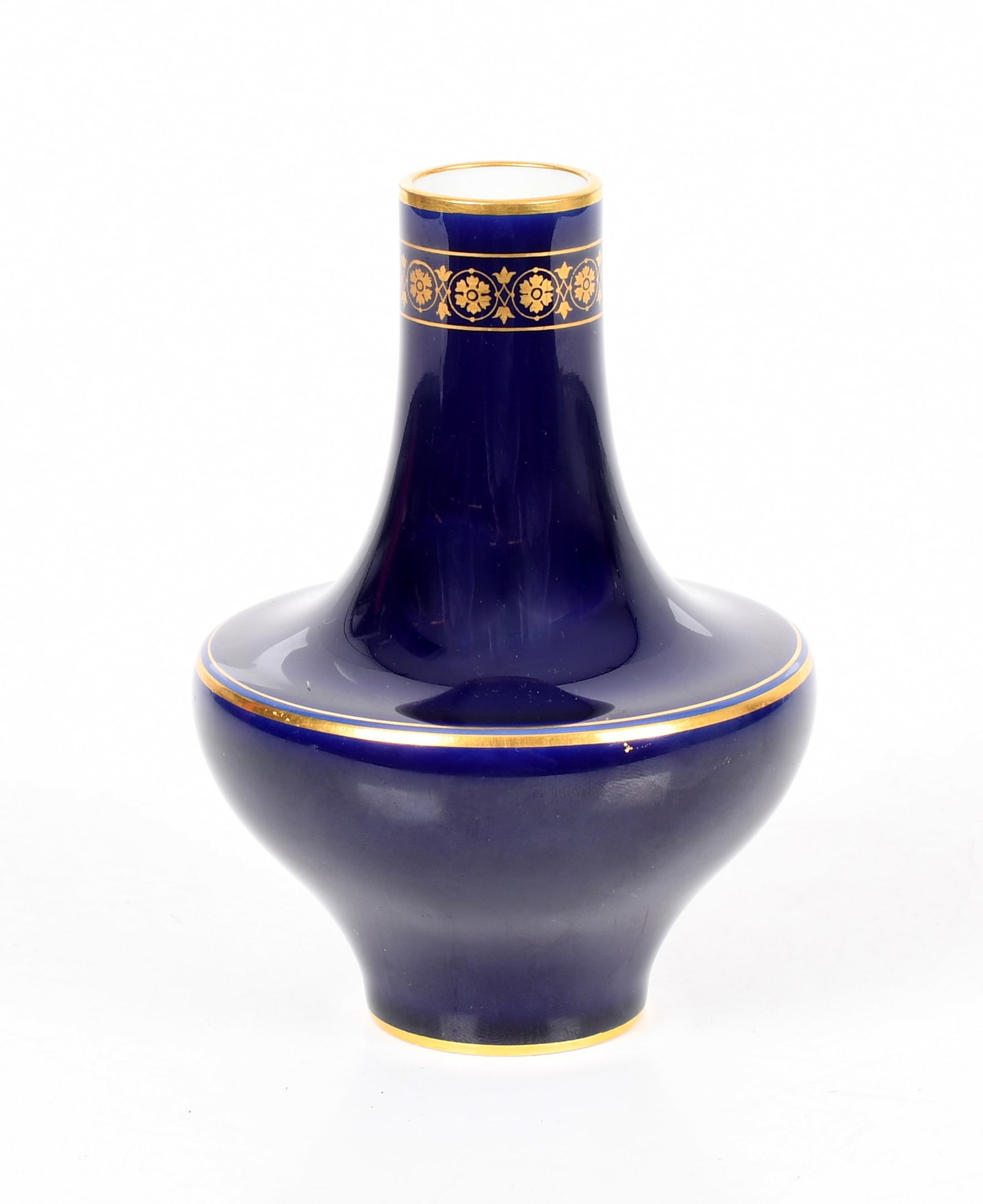 A Gilt Decorated Cobalt Blue Sevres Porcelain Vase: A Gilt Decorated Cobalt Blue Sevres Porcelain Vase An example dated for 1903 and 1923. Dimensions: 4in diameter, the height is 5 1/2in. 