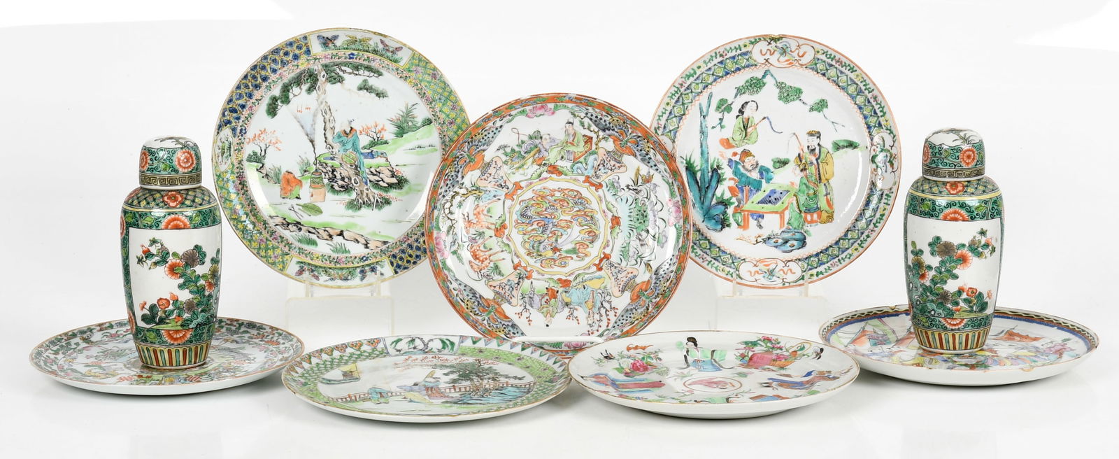 A Group of Chinese Porcelain: A Group of Chinese Porcelain All Qing Dynasty, comprising: a pair of Famille Verte jars and seven well decorated plates. Dimensions: the jars are 8 1/2in tall, each plate has a