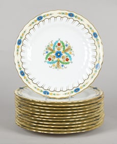 A Set of Porcelain Dinner Plates by Mintons