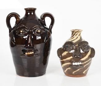 Two Walter Fleming Glazed Stoneware Face Jugs, 20th Century