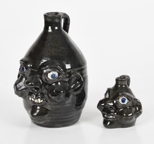 Two Grace Nell Hewell (Georgia, 1933-2016) Glazed Stoneware Face Jugs