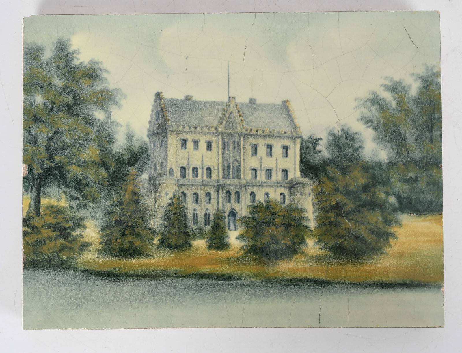 An English Painted Tile, 19th Century: An English Painted Tile, 19th Century An unsigned hand painted tile depicting a landscape with central church. Dimensions: 8 1/2in x 11 1/4in. Provenance: from