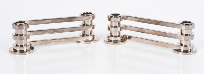 A Pair of Puiforcat Silver Plated Ruban Candleholders