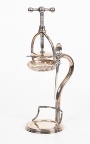 A Silverplate Citrus Press