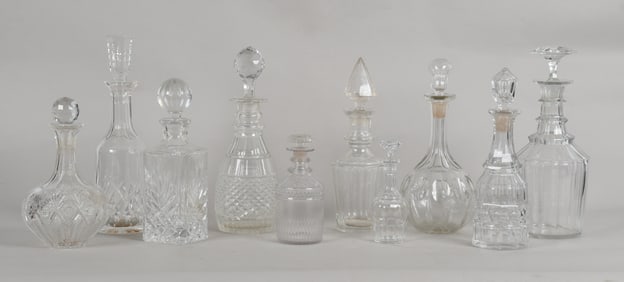 Group of Ten Clear Cut and Molded Glass Decanters, 19th-20th Century