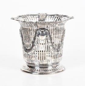 A Sterling Silver Wine Bottle Coaster by Gorham