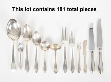 A Sterling Silver Dinner Service by Dominick & Haff