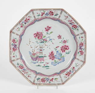 Chinese Export Porcelain Famille Rose Octagonal Charger, Qianlong Period: A Chinese Export Porcelain Famille Rose Octagonal Charger, Qianlong Period, Circa 1740 Decorated with a vase and jardiniere with blossoming trees and blooming flowers to the center, the bord