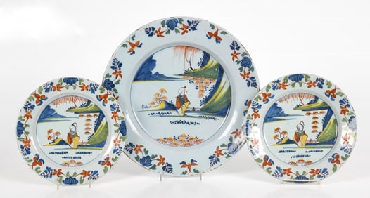 English Delftware Tin Glazed Polychrome Decorated Pair of Plates and Charger