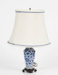 Chinese Porcelain Blue and White Vase / Lamp, Qing Dynasty: A Chinese Porcelain Blue and White Vase, Qing Dynasty Lion mask handles to either side. Now mounted as a table lamp. Dimensions: Height of vase 7 1/4in; height overall 19 1/2in. Provenanc