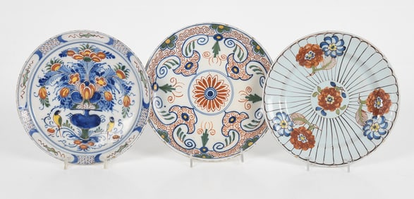Three English and Dutch Delftware Tin Glazed Polychrome Decorated Plates