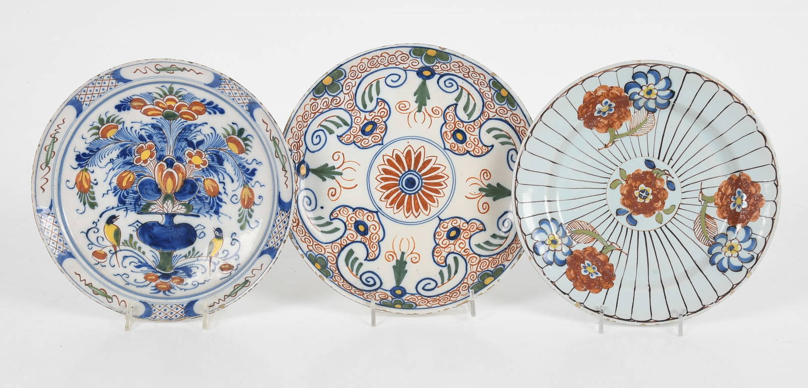 Three English and Dutch Delftware Tin Glazed Polychrome Decorated Plates