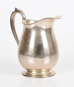 A Sterling Silver Water Pitcher by Fisher