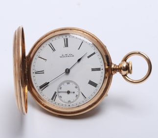 A 14k Gold Hunter Case Pocket Watch by American Watch Co.