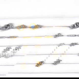 Eleven piece lot 10K 14K cufflinks pin rings misc: Eleven piece lot that includes one pair of 14K white and yellow gold sapphire cufflinks, three baby pins marked 10K, monogrammed HBG, two 14K sapphire filigree pins, two 10K fraternity pins, and three