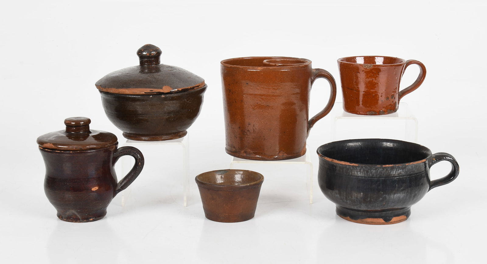 Group of American Lead and Manganese Glazed Redware, 19th Century: An Assembled Group of American Glazed Redware, 19th Century Comprising a 4 1/2in lead glazed shaving mug with soap cup insert, purchased at Black Angus, Adamstown, Pennsylvania, 1981; a 2 1/4in m