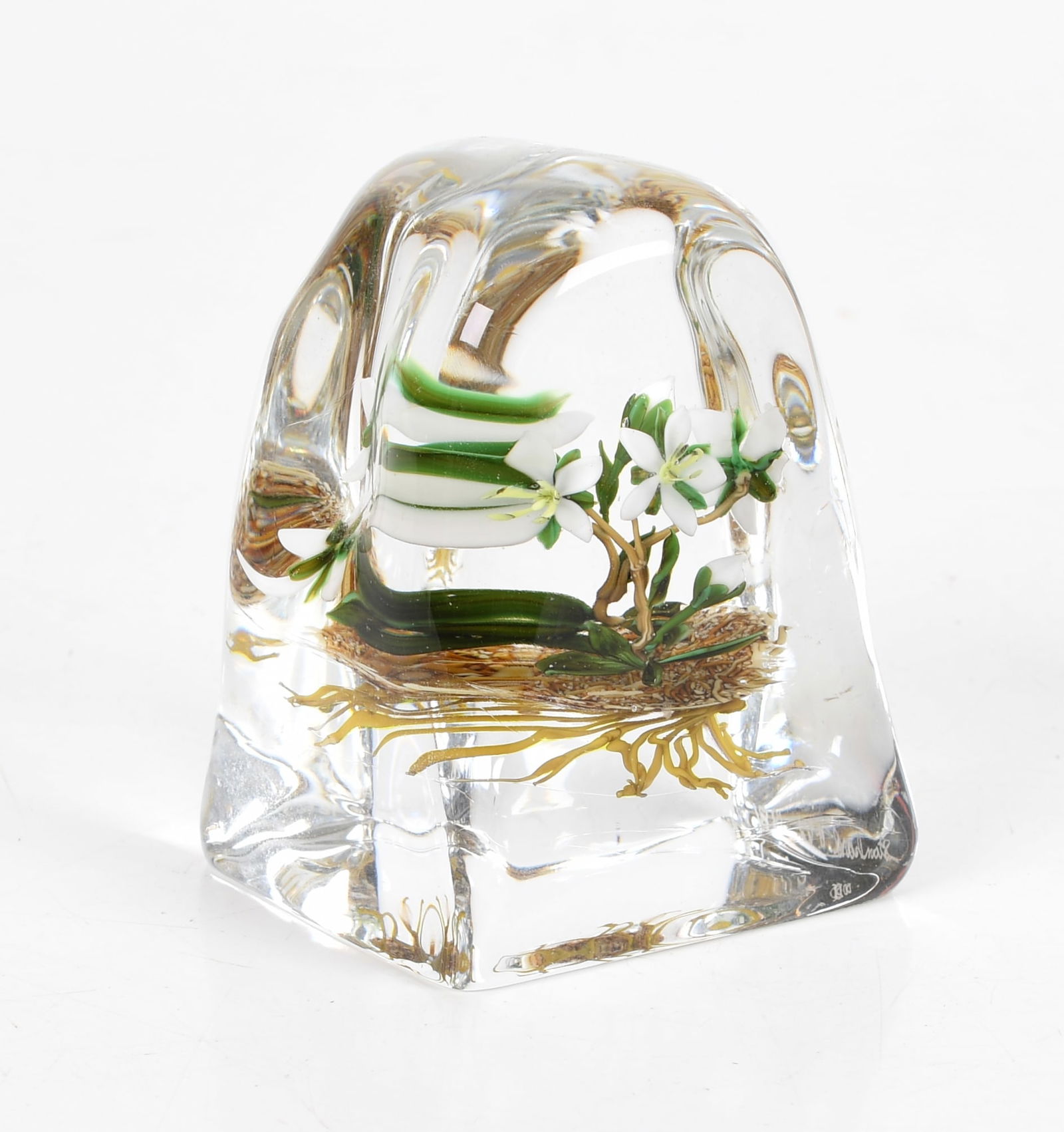 Paul Stankard (b.1943), Paperweight, Natural Form: A paperweight by Paul J. Stankard, the glass in a natural form with interior flowers and roots, with an interior "S" cane at the roots, signed "Stankard #62 1981" Dimensions: 