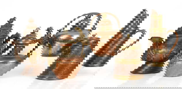 Five Pieces of Tibetan Copper Table Ware: Five Pieces of Tibetan Copper Hollow Ware, Comprising: a 10" H x 12" W teapot with elephant motif spout and floral decoration, a large 14" H x 14" W ewer with wooden body and