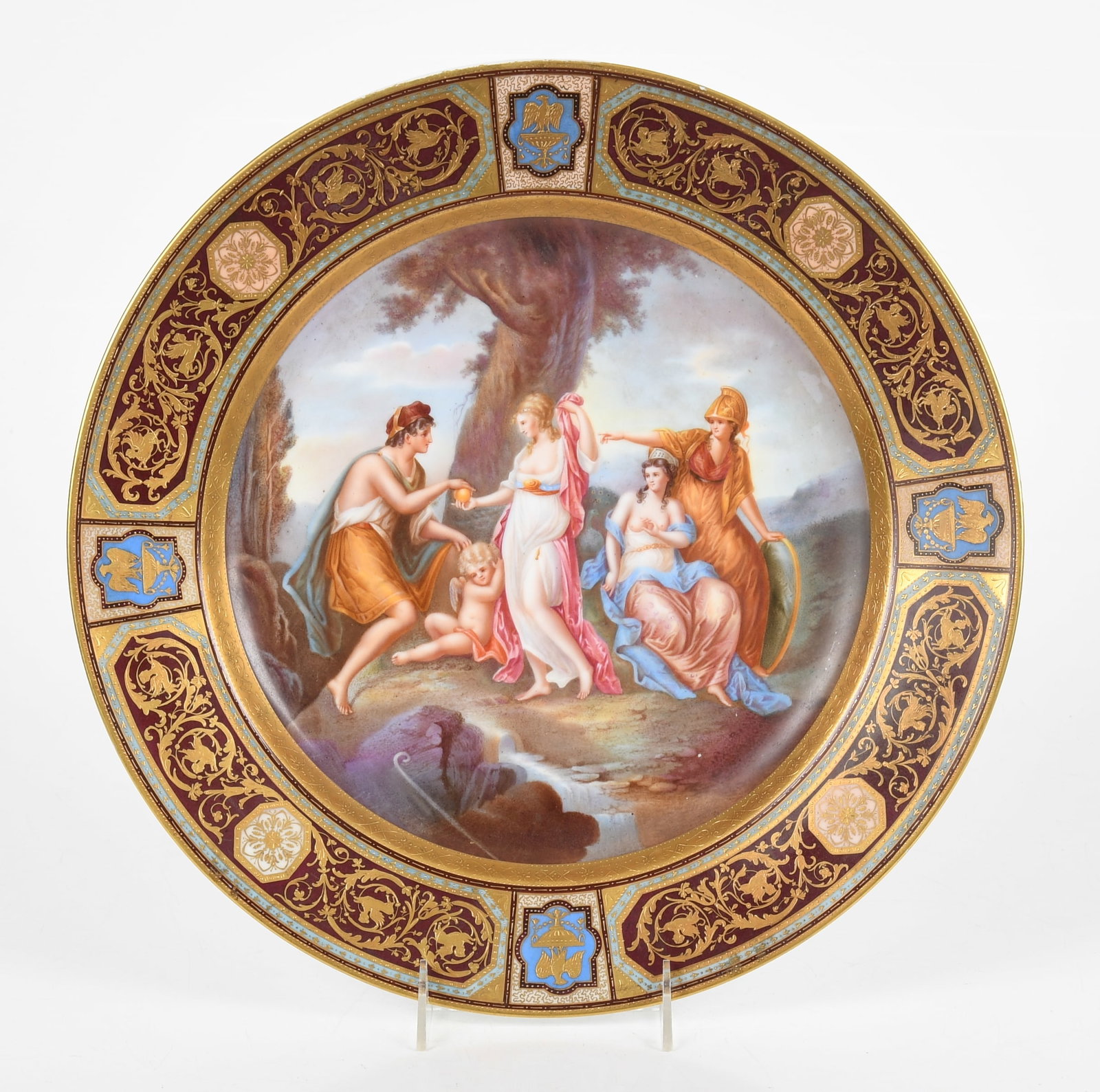 A Royal Vienna Porcelain Charger: A Royal Vienna Porcelain Charger A 19th century example with hand painted decoration depicting the Judgement of Paris. Dimensions: the diameter is 14 1/2in diameter. 