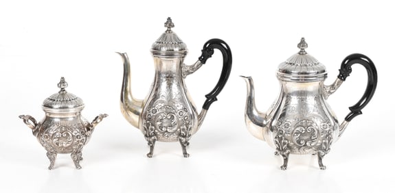 A Three Piece .800 Silver Tea Set
