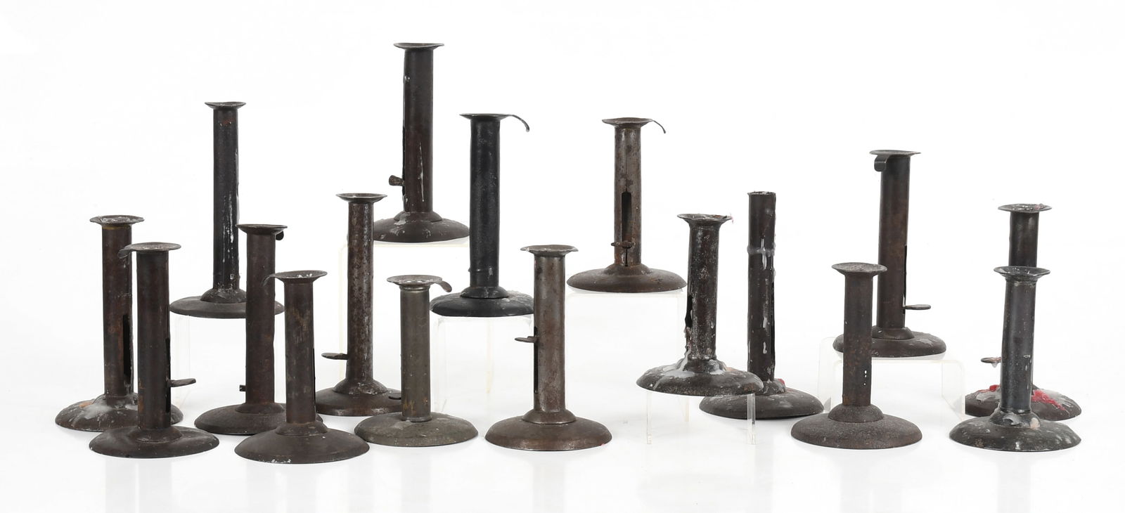 Seventeen Tinned Sheet Iron Hog Scraper Push-up Candlesticks, 19th Century (1 of 9)