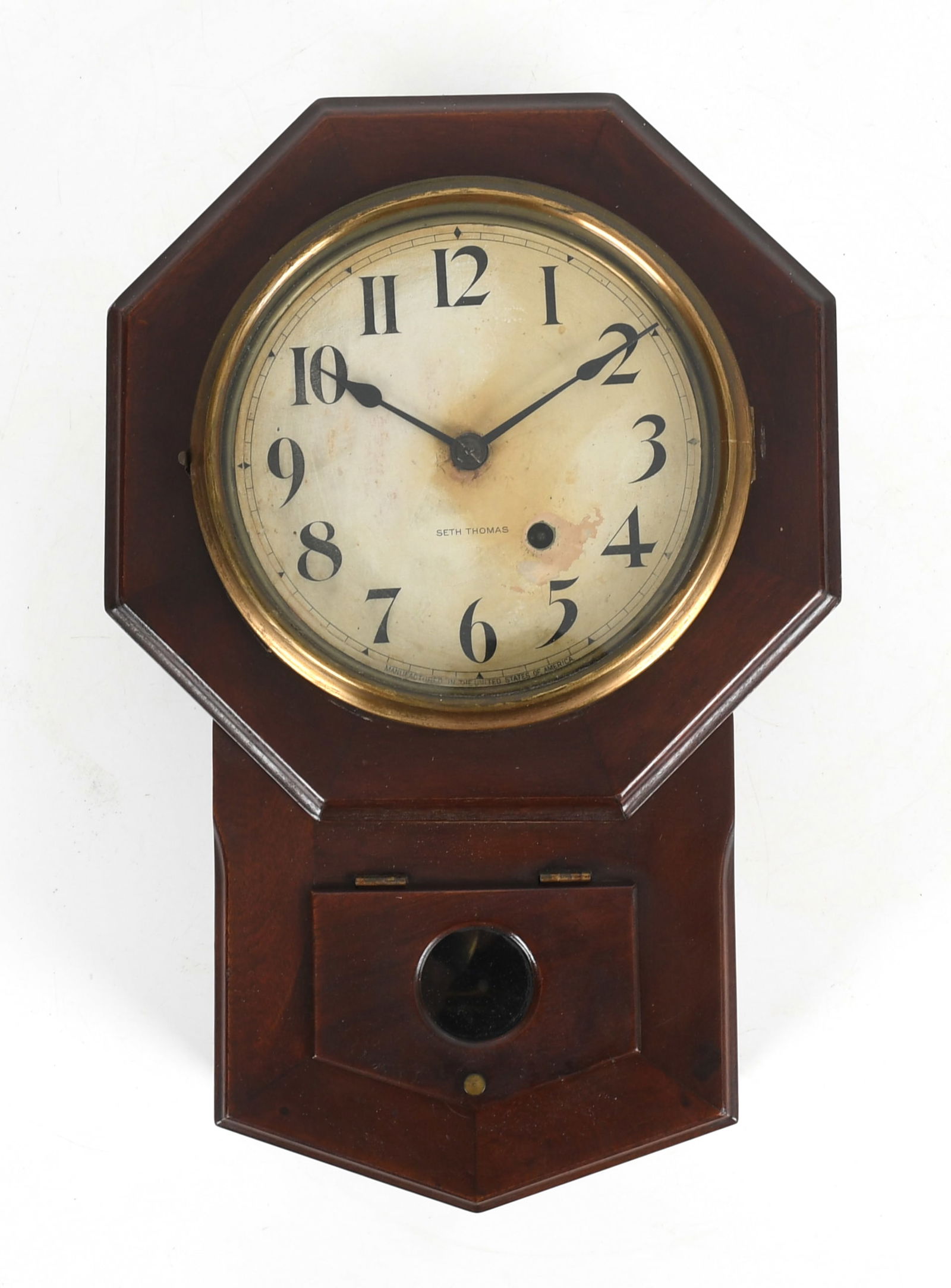 Seth Thomas 'School House' Mahogany Drop Octagon Wall Clock, Early 20th Century: A Seth Thomas 'School House' Mahogany Drop Octagon Wall Clock, Early 20th Century The eight-inch circular printed dial having Arabic numerals, single train time movement inscribed, 'S