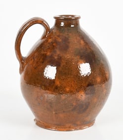 American Mottled Manganese and Lead Glazed Redware Ovoid Jug, 19th Century