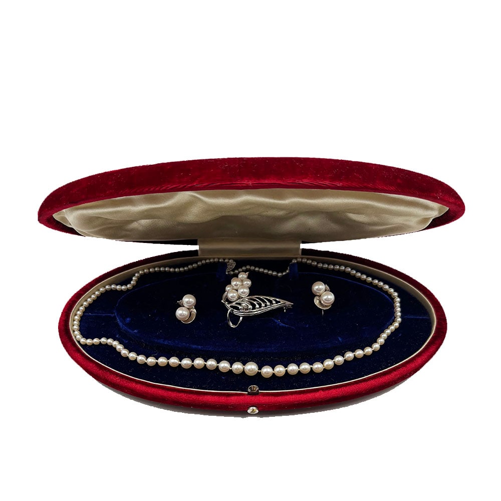 Mikimoto 14K Gold Pearl Earrings with Necklace and Pin: A pair of signed Mikimoto14K white gold earrings with matching pin and graduated pearl necklace. The earrings are only marked Mikimoto, the pin and necklace are unmarked. The earrings are screwback. E