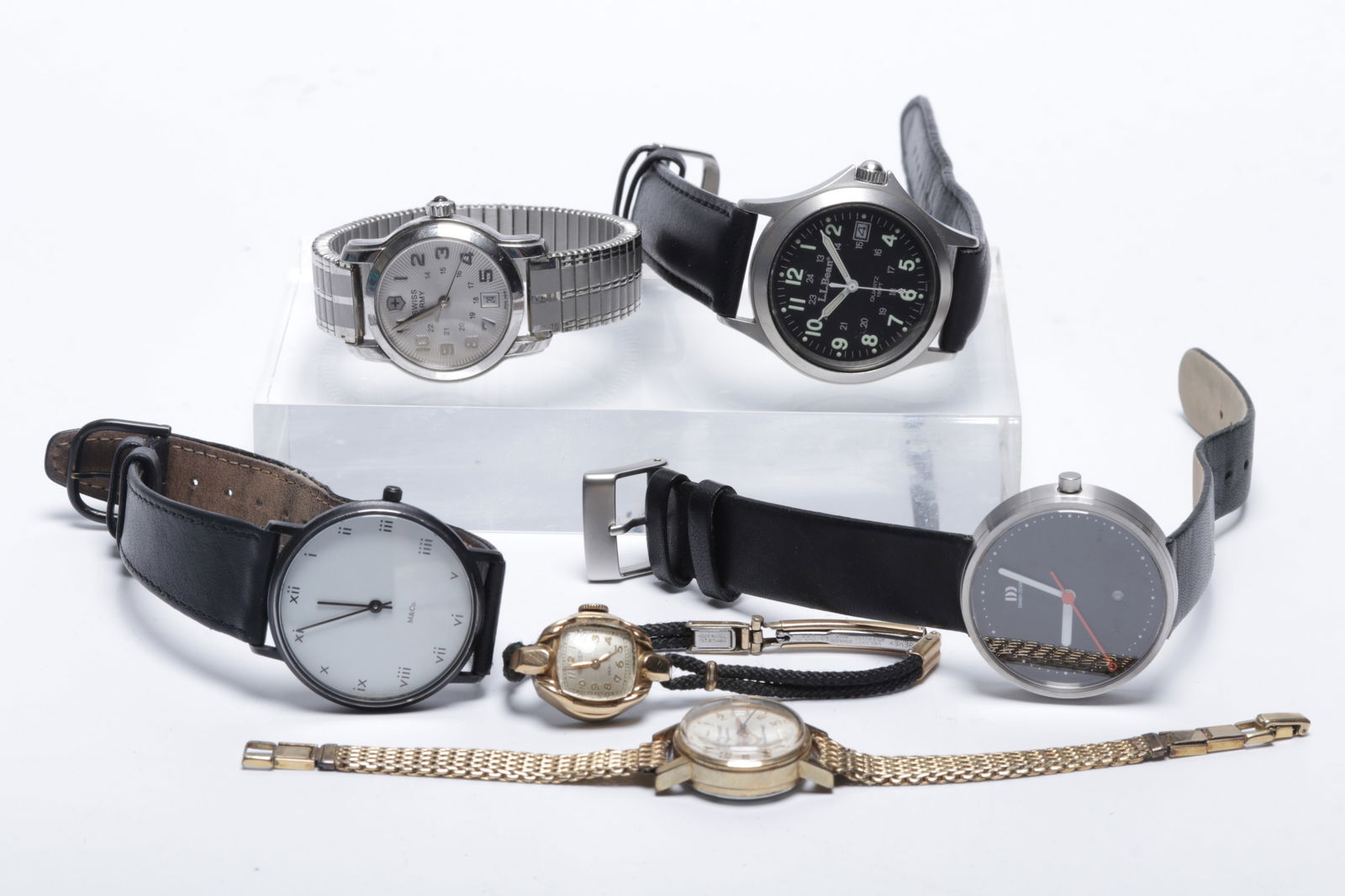 Six Wristwatches, L.L.Bean, Victorinox, and Women's Watches, Among Others: Six Wristwatches, L.L.Bean, Victorinox, and Women's Watches, Among Others Comprising: a 34mm L.L Bean field watch with a quartz movement, date window and screw-down crown, the watc