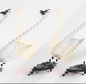 A Pair of Chinese Life Size Bone Veneered Geese: A Pair of Chinese Life Size Bone Veneered Geese A pair of 20th century bone veneered geese figures with carved horn feet and beak and agate at each head. Dimensions: Each is 7in x 14in and