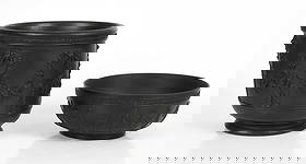 Wedgwood Black Basalt, Planter and Bowl: Wedgwood Black Basalt, Planter and Bowl Both 20th century, comprising: a large bowl decorated with the "Dancing Hours" with arabesque and acanthus borders, and a planter deco