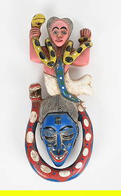 Mask, Guro Peoples, Ivory Coast, West Africa: Mask, Guro Peoples, Ivory Coast, West Africa A polychrome wooden example, the mask surrounded and surmounted by snakes and a female figure. Dimensions: 9in x 22 1/4in.