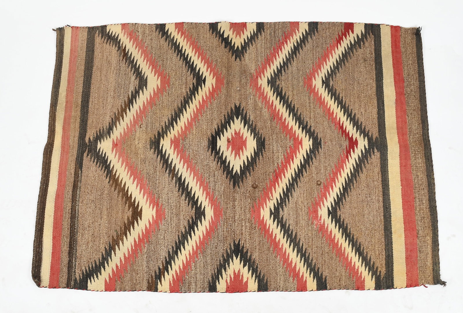 Navajo (Diné) Rug, 20th Century: A Navajo (Diné) Rug, 20th Century Woven in red, black, tan and gray. Dimensions: Dimensions approximately 4ft 6in x 3ft 3in.
