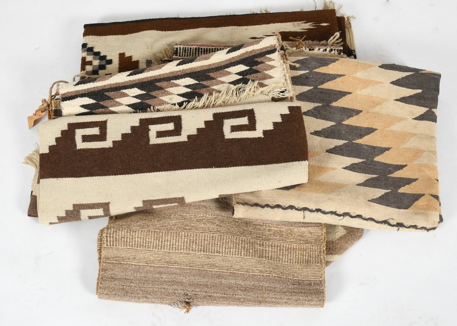 Group of Eight Southwestern Rugs and Textiles, 20th Century: A Group of Eight Southwestern Rugs and Textiles, 20th Century Comprising eight American Southwestern and Mexican rugs and small textiles. (8) Dimensions: Dimensions approximately range from 42 x 22in 