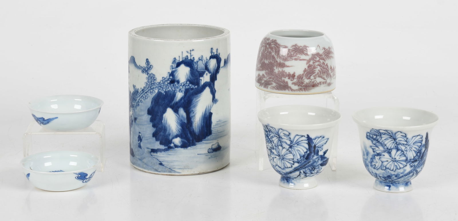 A Group of Chinese Blue and White Porcelain: A Group of Chinese Blue and White Porcelain A brush pot, a pair of small dishes, a pair of pheasant decorated cups and a water coup. Dimensions: from 3in to 4i