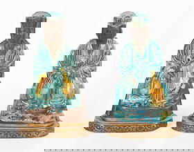 A Pair of Chinese Ming Dynasty Ceramic Figures: A Pair of Chinese Ming Dynasty Ceramic Figures An assembled pair of similar seated officials or philosophers, each mounted on a later metal base. Dimensions: each is 5 1/2in x 3in and 8 1/