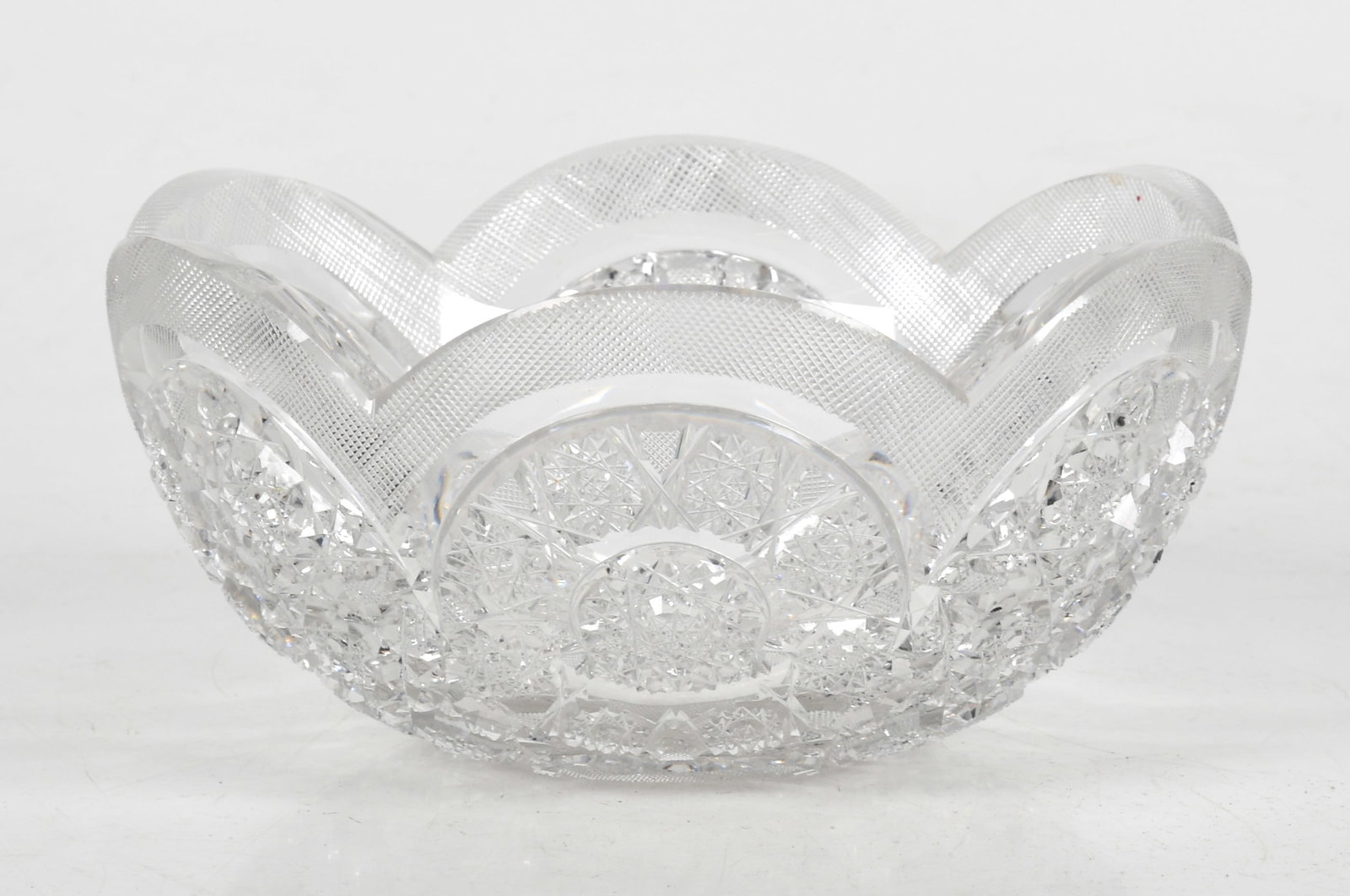 An American Brilliant Cut Glass Bowl, Taylor Brothers: An American Brilliant Cut Glass Bowl, Taylor Brothers By Taylor Brothers in the Belleveue pattern. Dimensions: 8" in diameter x 3 3