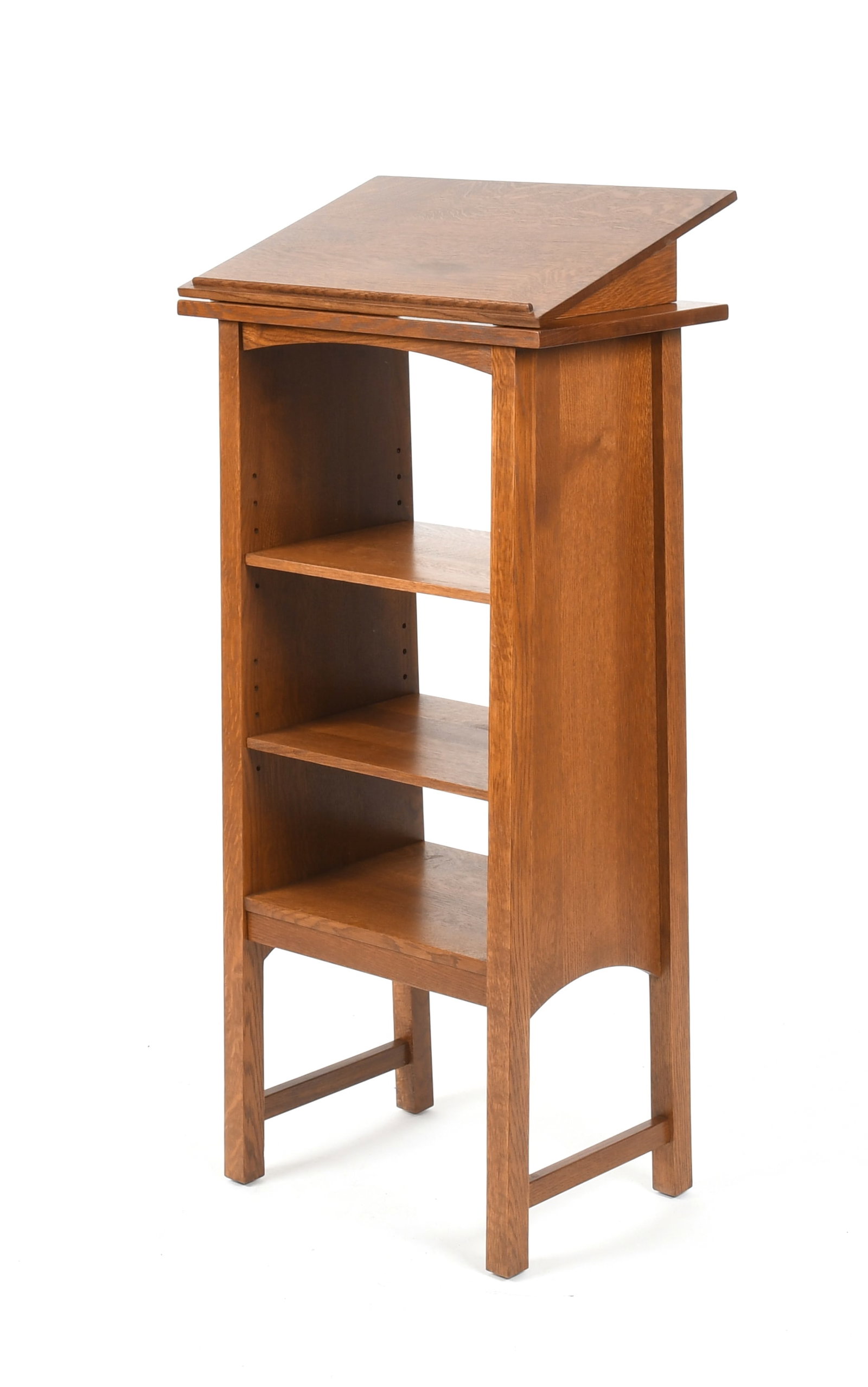 A Stickley Lectern Bookcase: A Stickley Lectern Bookcase No. 89-71, a lectern bookcase in oak with two moveable shelves and removable book rack top, stamped date for 2010. Dimensions: the top i